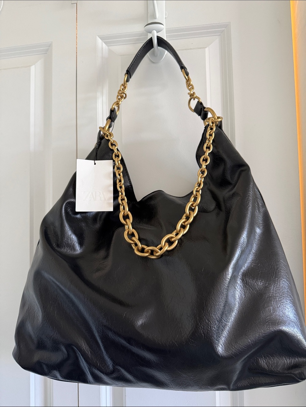 ZARA FR Black Hobo Bag with Gold Chain Accent